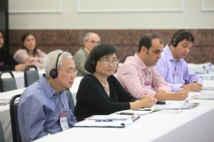 Convidados internacionais, dos Estados Unidos e de Portugal, assistem às palestras. Foto: Bruna Carvalho.